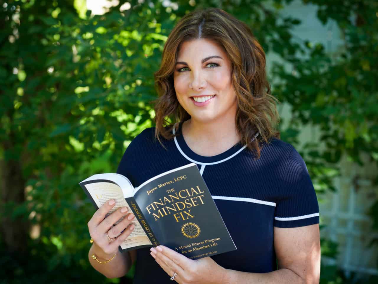 Joyce Marter Holding Book