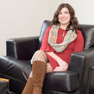 Joyce Marter sitting in chair